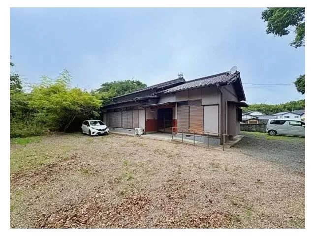 The garden area is spacious and can be utilized for parking and barbecues.