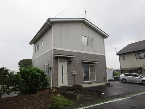 Located near Harmony Hall. A residential building with an office.