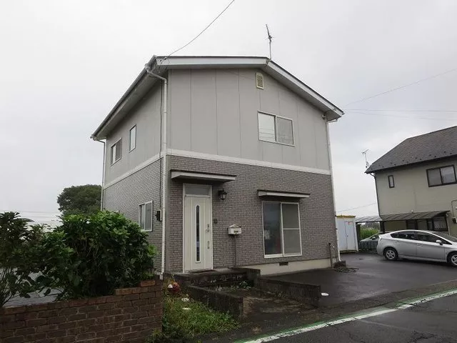 Located near Harmony Hall. A residential building with an office.