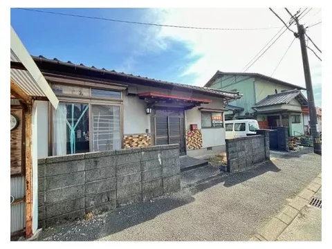 This highly visible single-story home along a main road is also suitable for business.