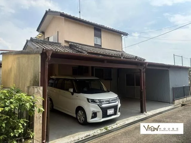 A house with a separate building, garage, and storage! Water facilities have been remodeled!
