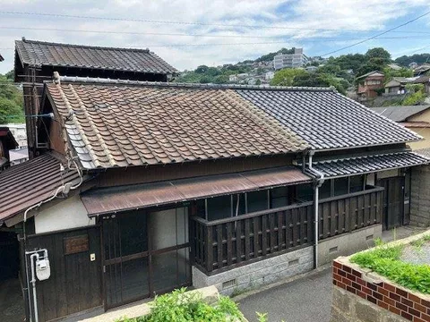 A detached house located in a quiet residential area.