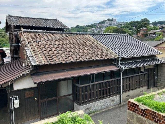 A detached house located in a quiet residential area.