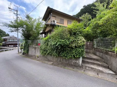 How about a villa in a place with nature, greenery, and a babbling brook?