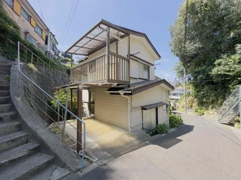 This is a detached house with a car space.
