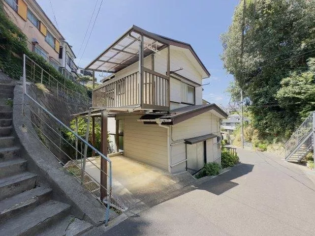 This is a detached house with a car space.