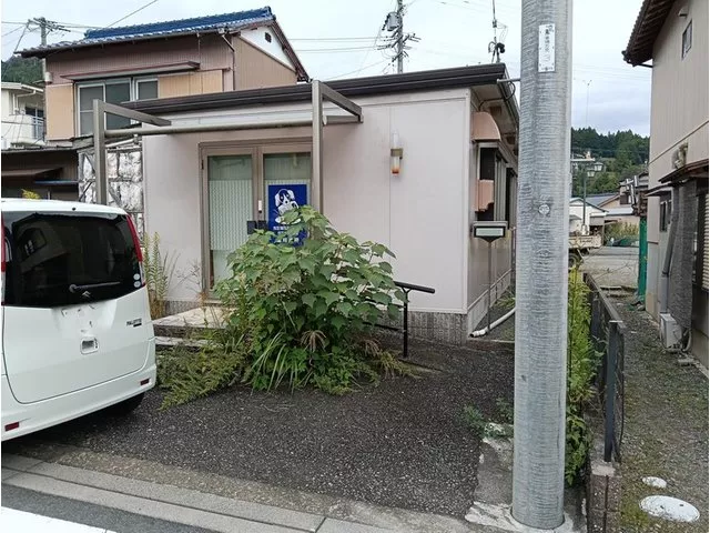 Building not registered, repair needed for washroom exterior wall