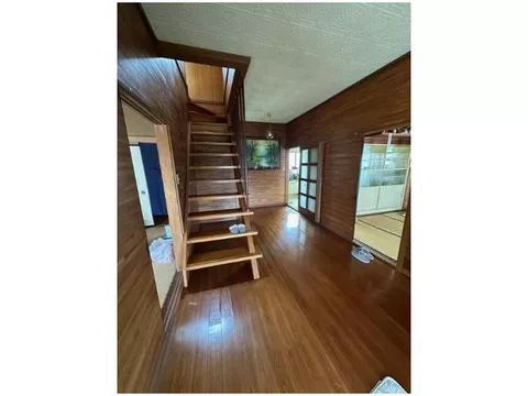This property features an attractive garden space where you can enjoy home gardening. - Image 2