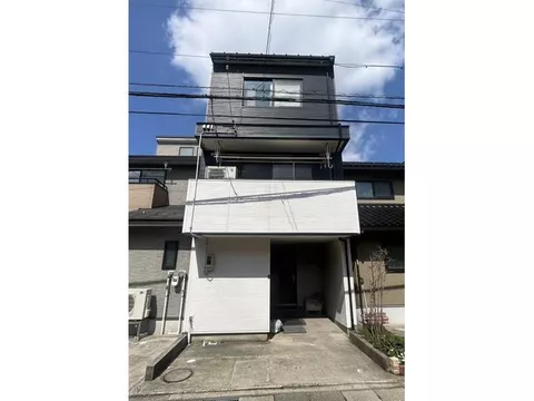 A three-story building in a quiet residential area. Beautiful home with renovated interior and exterior! All-electric house.