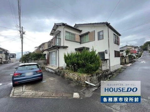 The charm of an open corner lot with a view! A home with a storage room that offers ample storage