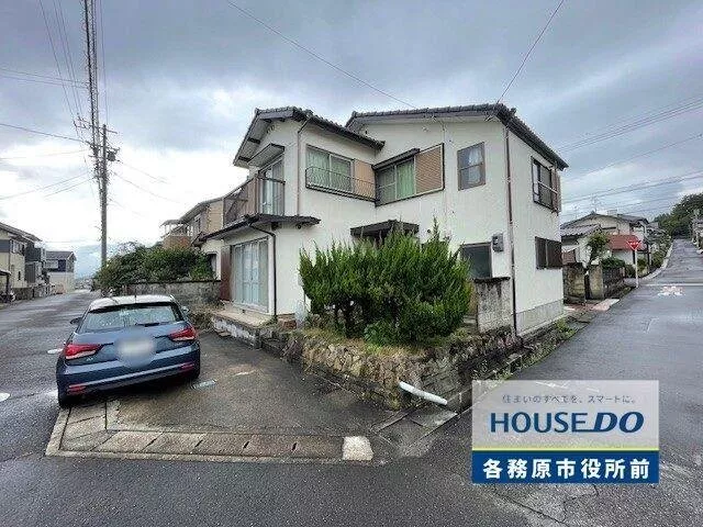 The charm of an open corner lot with a view! A home with a storage room that offers ample storage